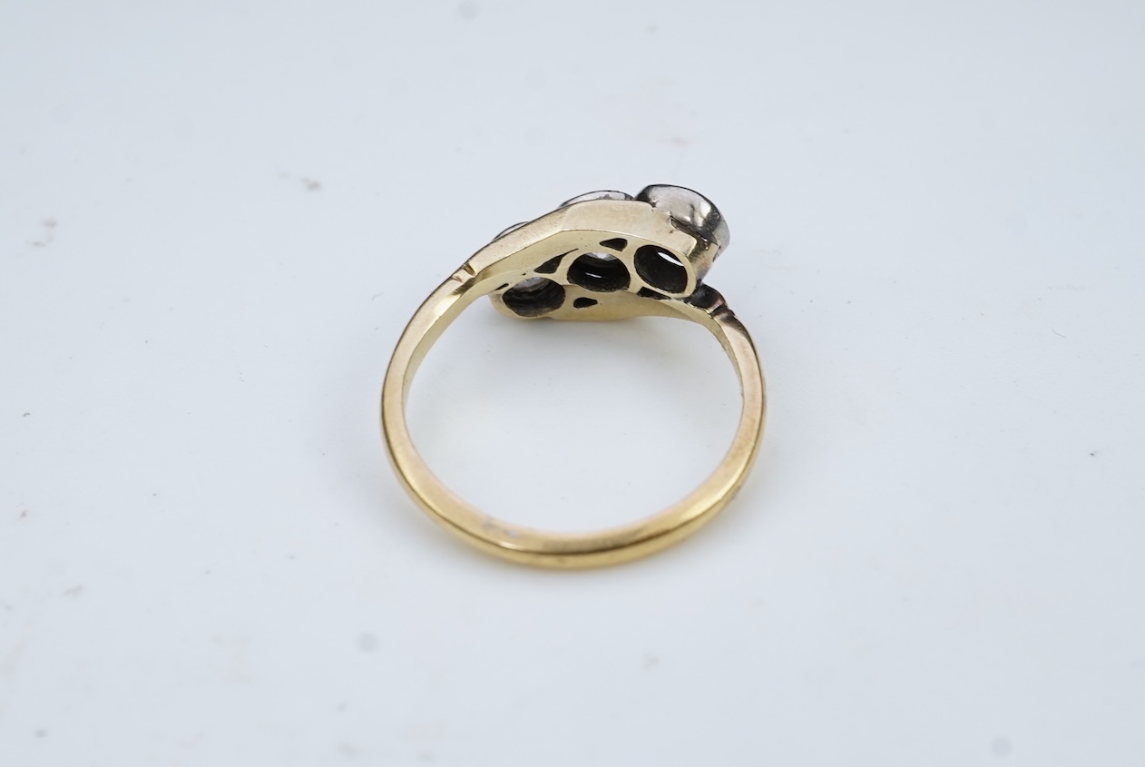 A three-stone diamond ring, early 20th century